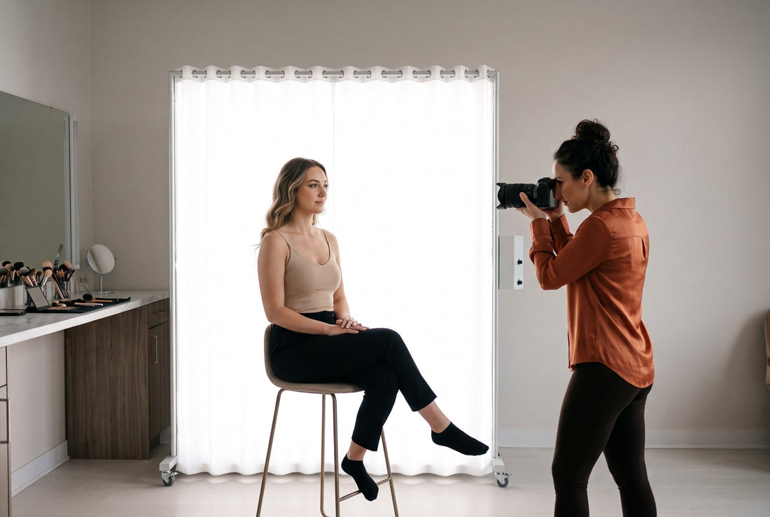 Photographer shooting a beauty close-up of a client lit by a LEDWindow PRO panel next to a makeup station