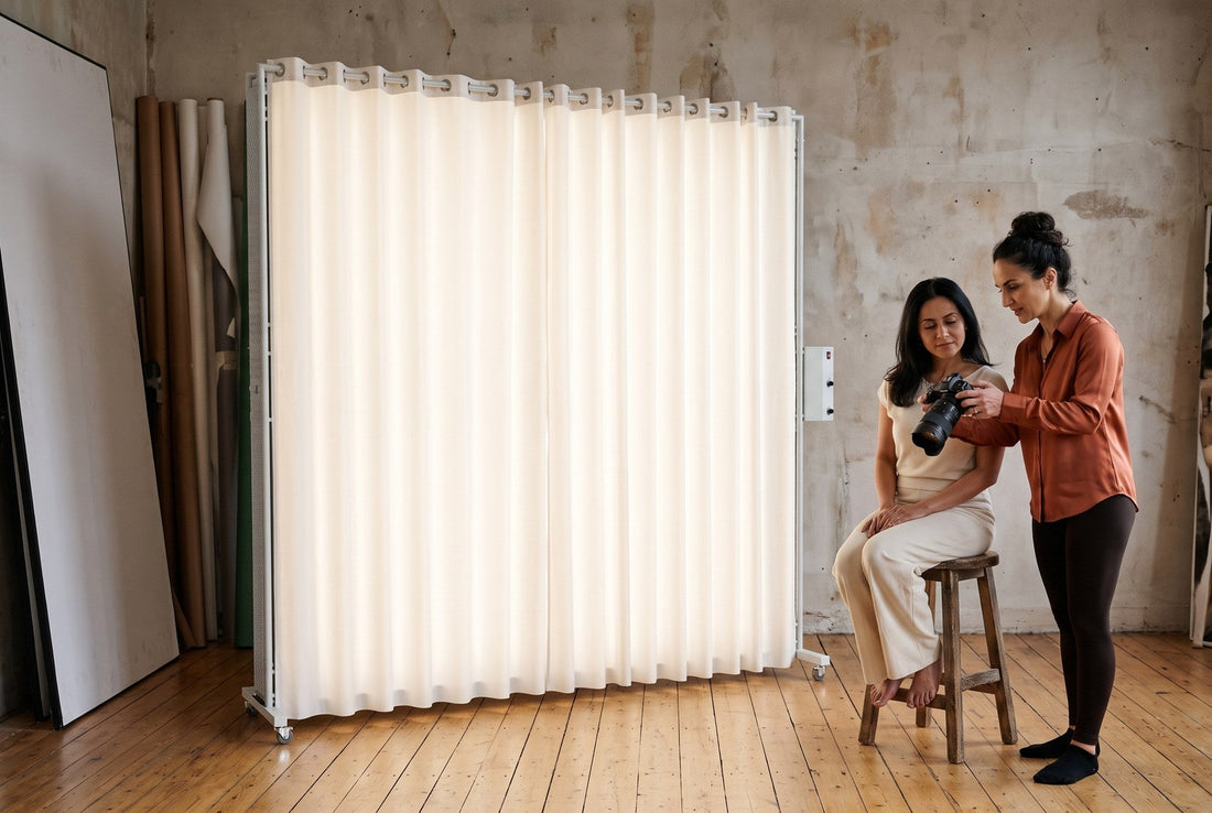 Photographer showing a client the camera screen beside a LEDWindow PRO window-light panel
